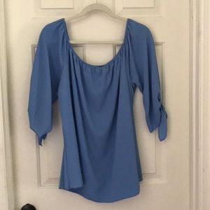 Belle Blue shirt with knotted sleeves